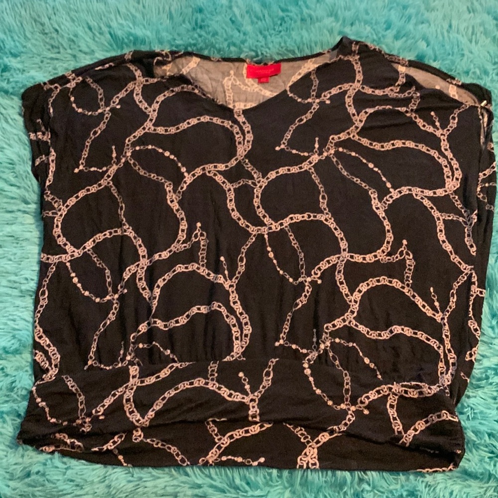 Jennifer Lopez cold shoulder shirt